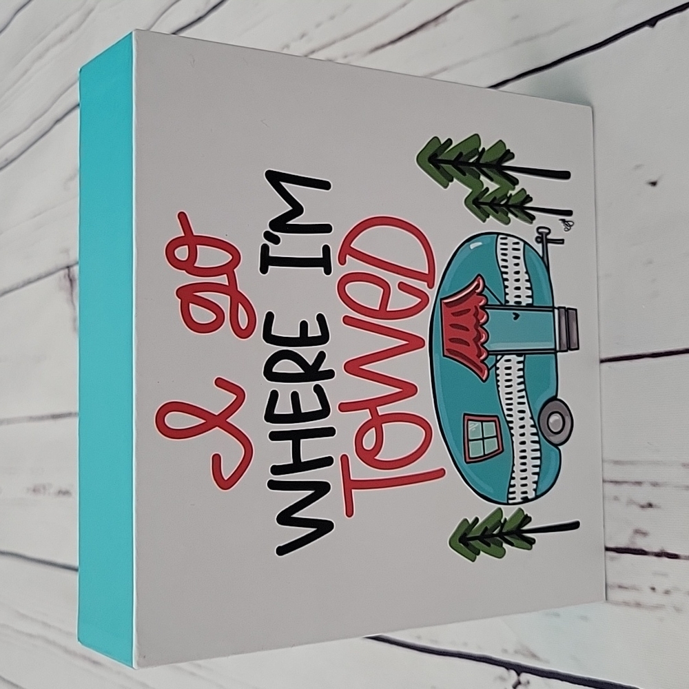 I go where I'm towed wood table decor